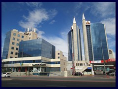 Murcia new part 26 - Las Atalayas, 90m high 23-storey twin skyscrapers from 2007. A large shopping center is next to it.